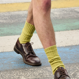 Man wearing green bandana ribbed crew socks by Escuyer, made in Portugal