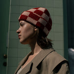 Checkered merino wool beanie shown on a plain background