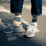 Escuyer Women's striped socks worn with New Balance sneakers — 5 Stripes collection, made in Portugal