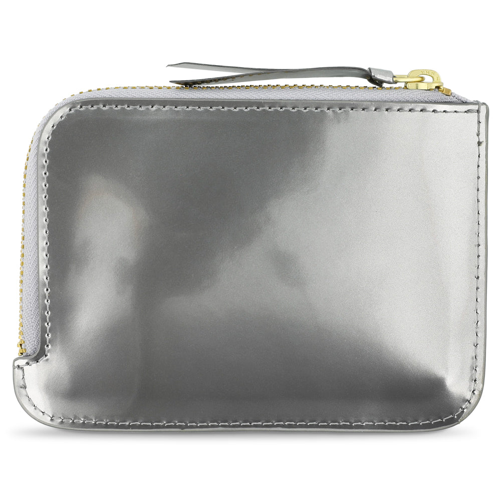 Escuyer Argent Métallisé zip wallet showing iridescent metallic finish and zip closure