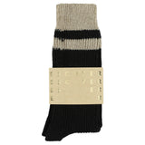 Close-up of Escuyer Black / Beige striped cashmere socks — 10% cashmere, 38% virgin wool, GRS certified recycled polyamide