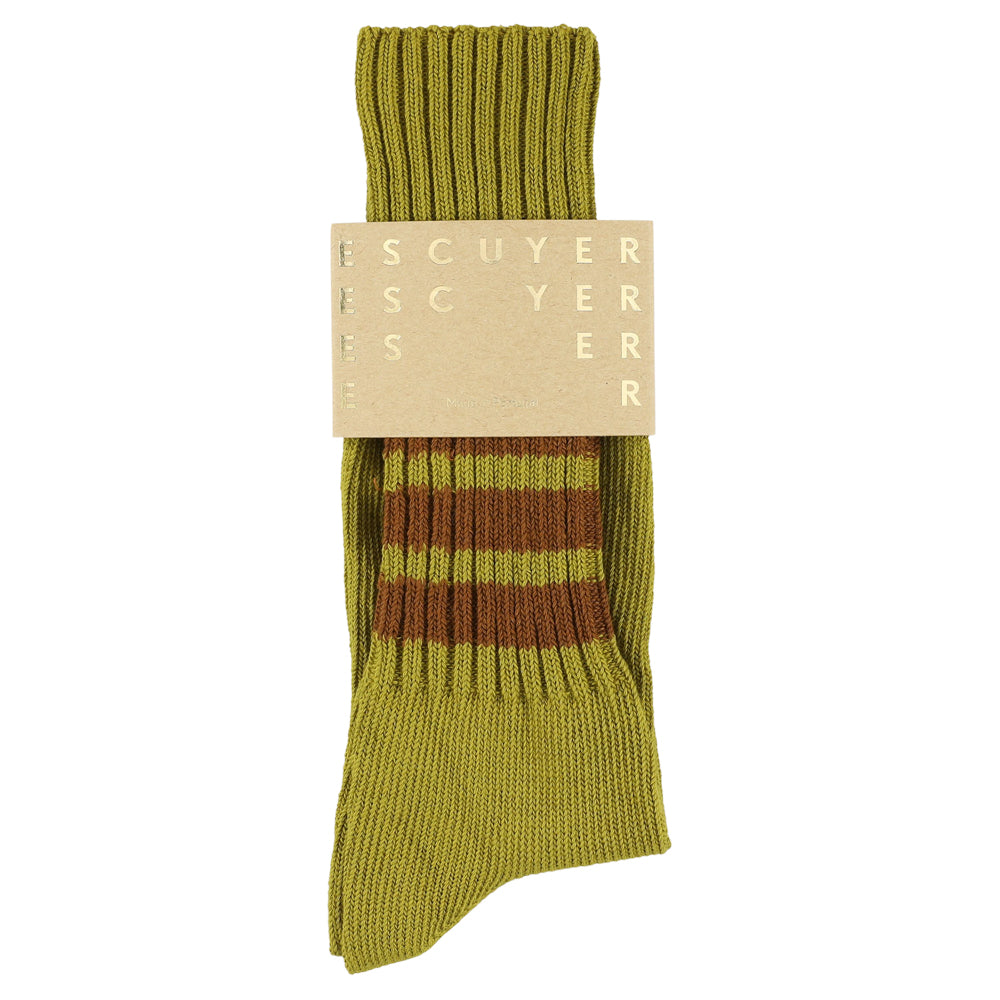 Green sock with brown stripes and 'ESCUYER' label on a white background