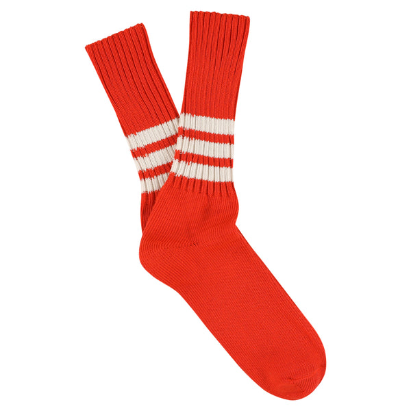 Orange socks with white stripes on a white background