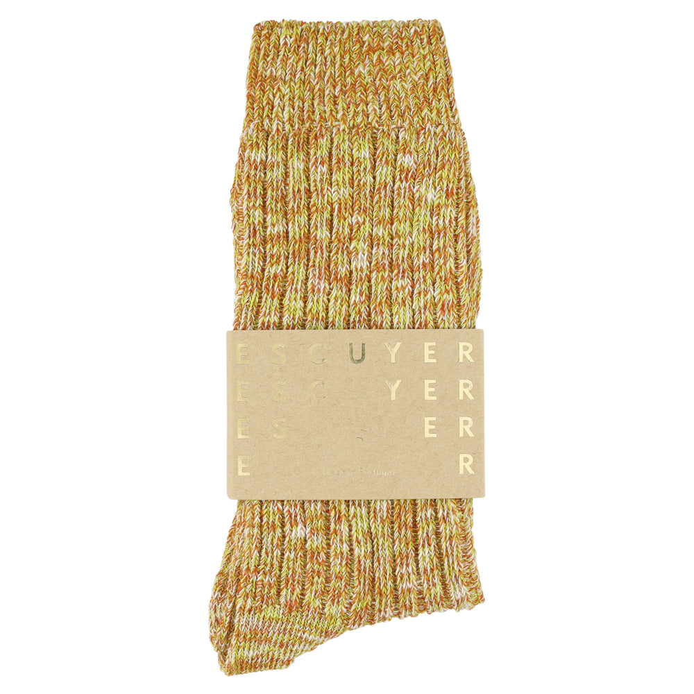 Knitted sock with a label on a white background