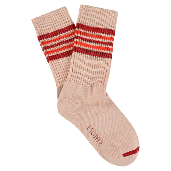 Pink sock with red and white stripes on a white background