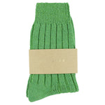 Close-up of Escuyer Golf Green women's cashmere crew socks — 10% cashmere, 38% virgin wool, GRS certified recycled polyamide