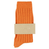 Close-up of Escuyer Orange women's cashmere crew socks — 10% cashmere, 38% virgin wool, GRS certified recycled polyamide
