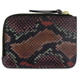 Escuyer snake print zip wallet showing embossed snake scale texture and zip closure