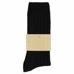 Close-up of Escuyer Black cashmere crew socks showing soft knit texture — 10% cashmere, 38% virgin wool, GRS certified recycled polyamide