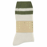 Close-up of Escuyer Ecru / Khaki striped cashmere socks — 10% cashmere, 38% virgin wool, GRS certified recycled polyamide