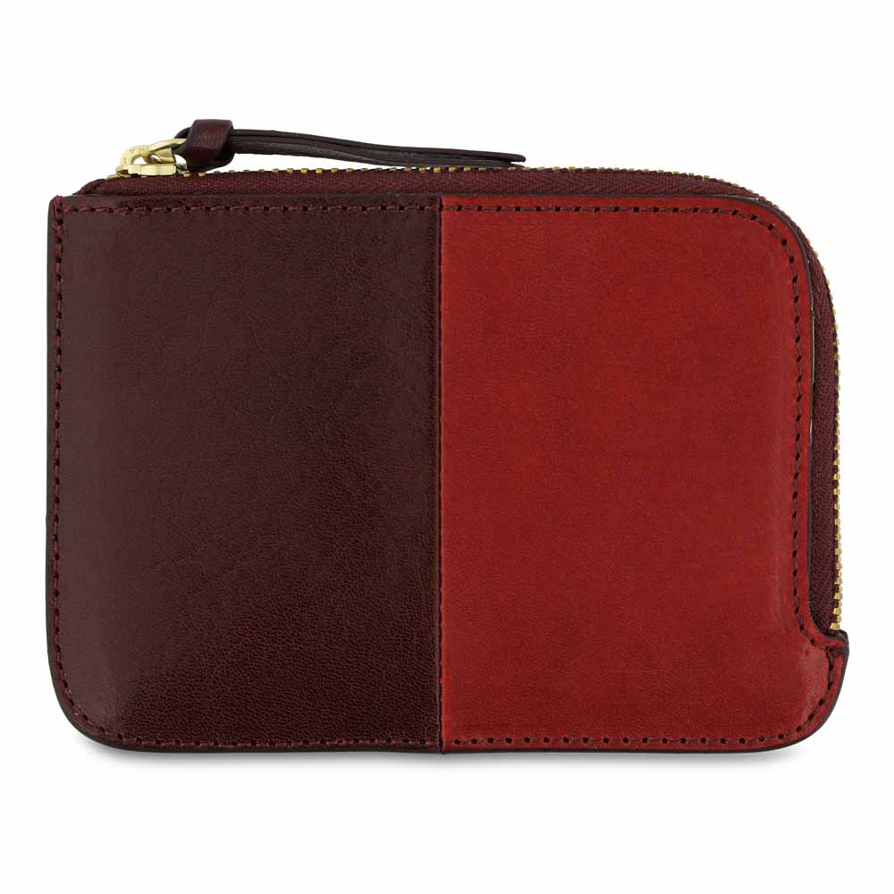 Escuyer burgundy and red zip wallet showing vertical colour-block split and zip closure