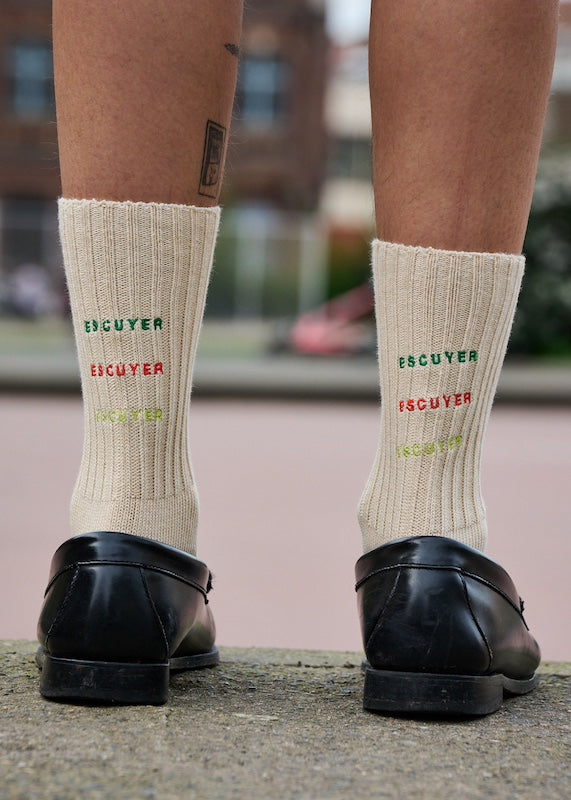 Woman wearing Escuyer logo ribbed crew socks, made in Portugal