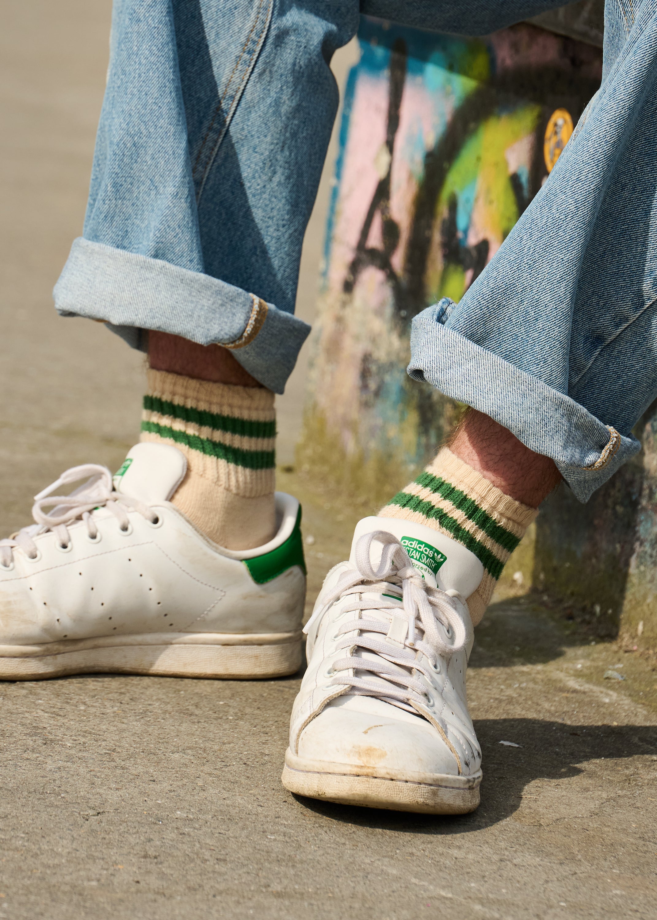 Man wearing Escuyer Men Striped Ankle Socks with Stan Smith sneakers — casual summer style