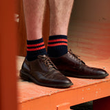 Man wearing Escuyer Men Striped Ankle Socks Green / Ecru with brown loafers — natural smart-casual style