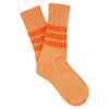 Pair of orange socks with orange stripes on a white background