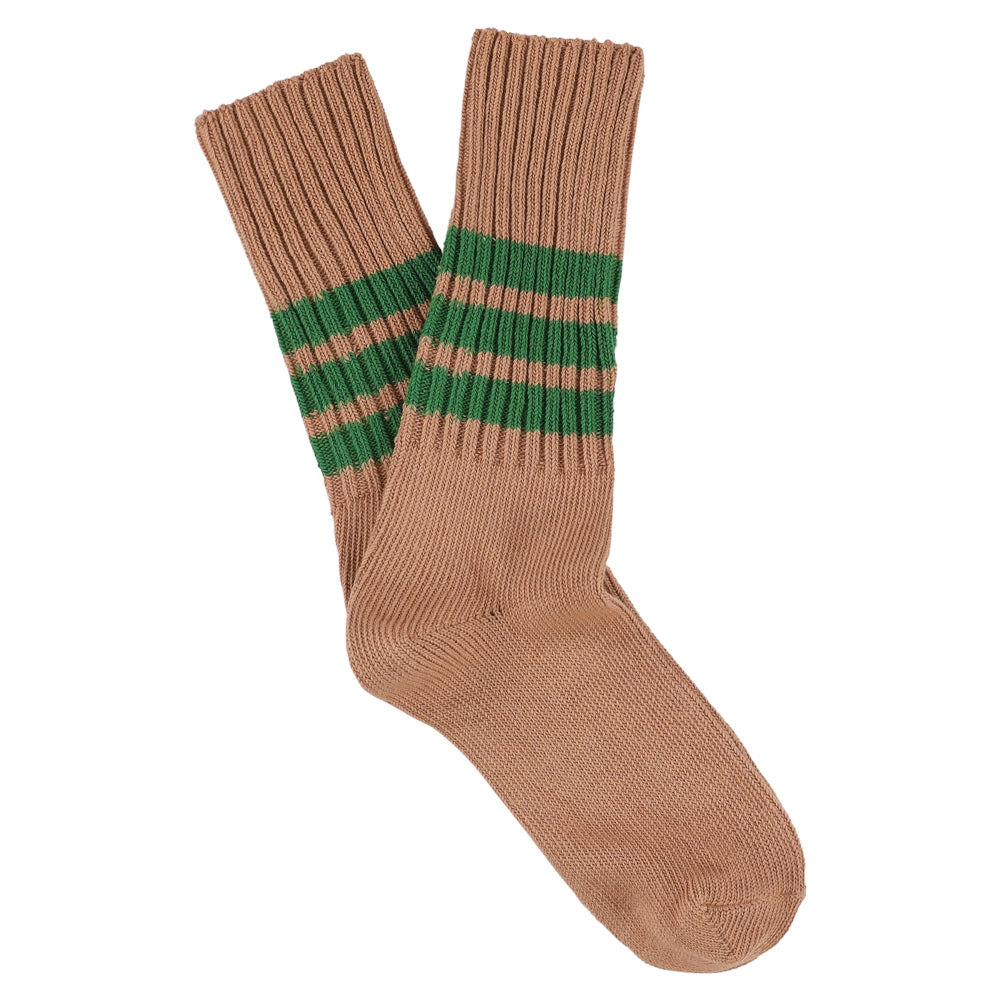 Pink sock with green stripes on a white background