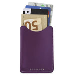 Escuyer purple leather card sleeve holding cards and a folded banknote — holds up to 8 cards