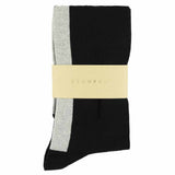 Close-up of Escuyer black and ecru combed cotton knee high socks with hand-linked toe