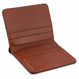 Escuyer cognac slim wallet showing slim profile and hand painted edges